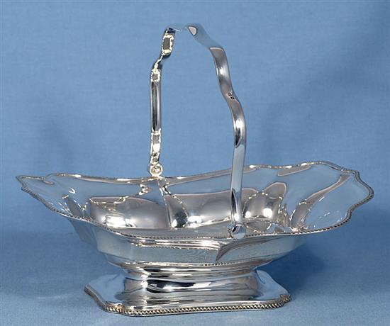 An Edwardian silver cake basket, by Atkin Brothers, length 268mm, weight 22.4oz/698grms.